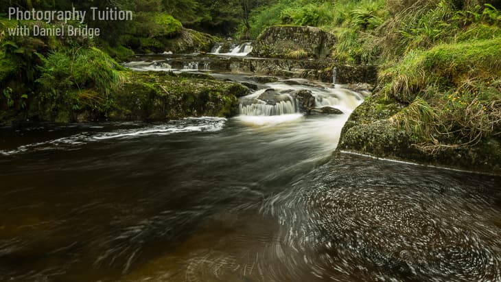 Long exposure photograph of a waterfall, as described during the Know The Basics photography workshop