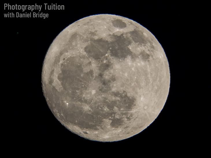 Photograph of a full moon.